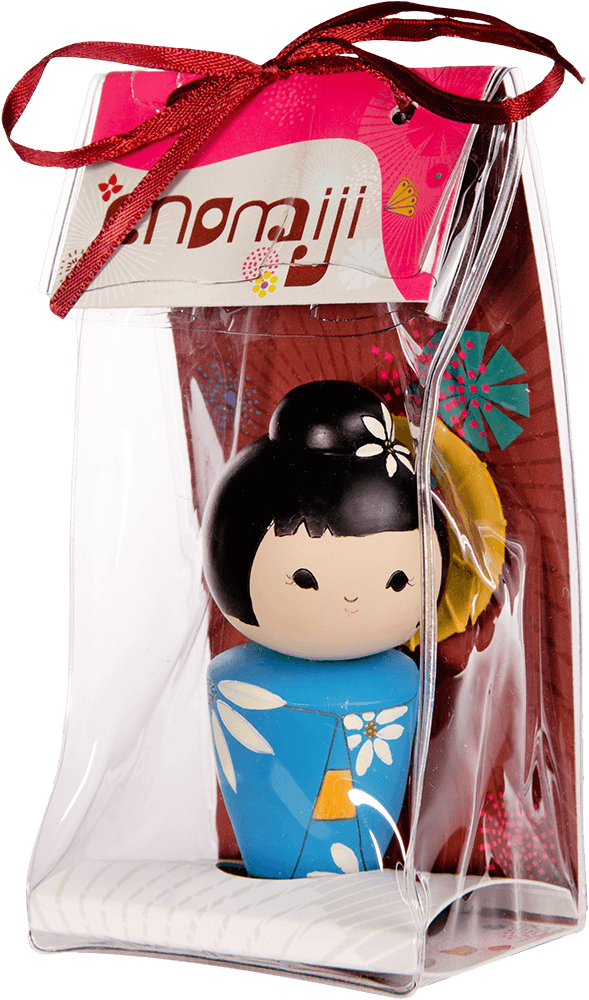 Cool Momiji doll in a clear display box, red ribbon and tag. Character details visible; kawaii vinyl collector's item. — Momiji Doll