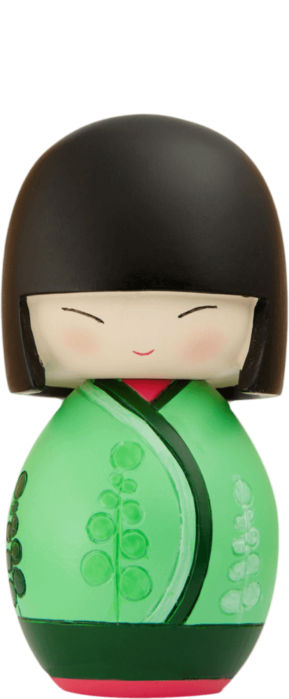 Soul Momiji doll with short black hair, sweet smile, and a bright green outfit. Each Momiji doll hides a secret message inside. — Momiji Doll