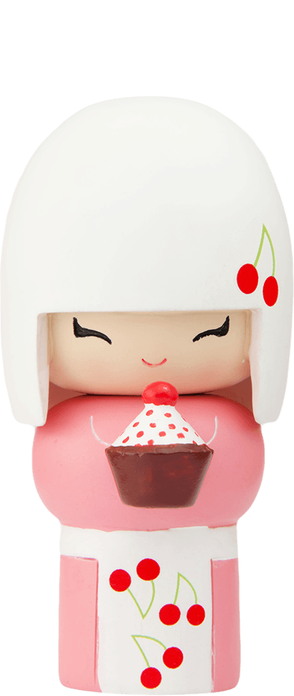 Pixie Momiji doll with white hair, pink outfit, cherry motifs, holds a cupcake topped with pink icing. — Momiji Doll