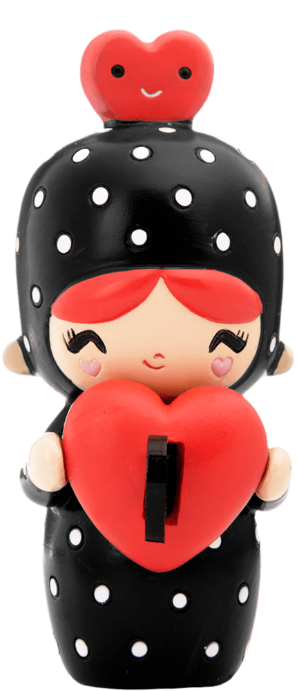 Dottie Momiji doll with bright red hair, black polka-dot outfit, and a red heart-shaped gift held in her hand. — Momiji Doll