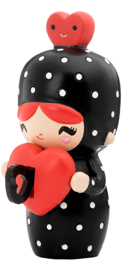 Dottie Momiji doll in a black polka-dot outfit holds a red heart, with a red heart accent on her head. — Momiji Doll