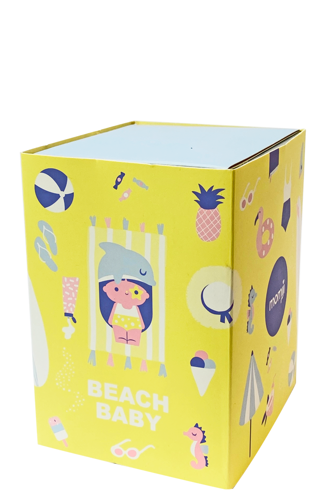 Beach Baby Momiji doll box with sunny yellow color, cute beach icons, and the Beach Baby character featured on the front. — Momiji Doll