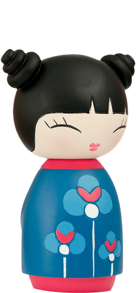 Hurray Momiji doll with black hair in buns, closed eyes, pink lips, and blue dress patterned with heart flowers. — Momiji Doll