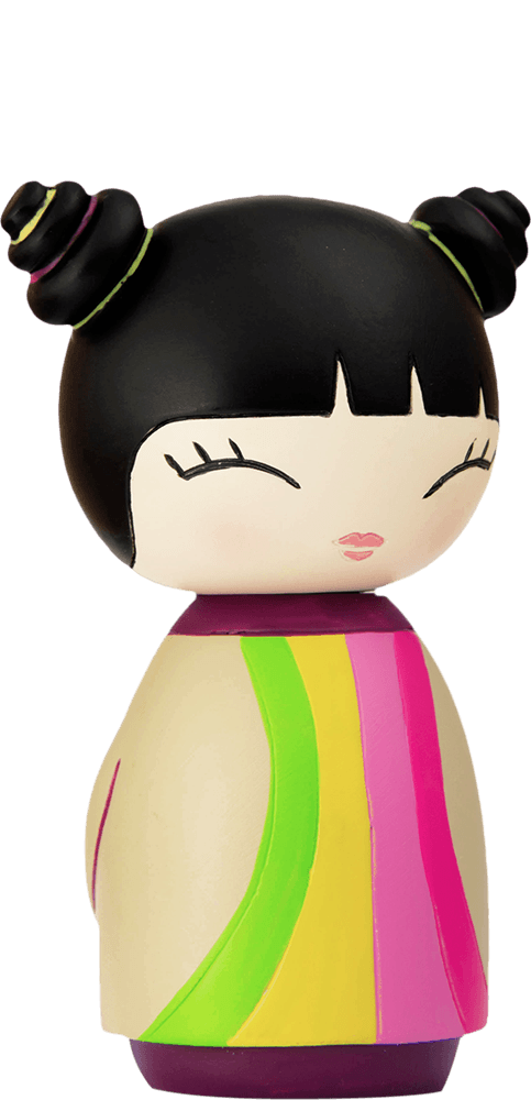 Party Girl Momiji doll with black hair in buns, wearing a bright, colorful dress. Includes secret message slot. Collectible vinyl figure. — Momiji Doll