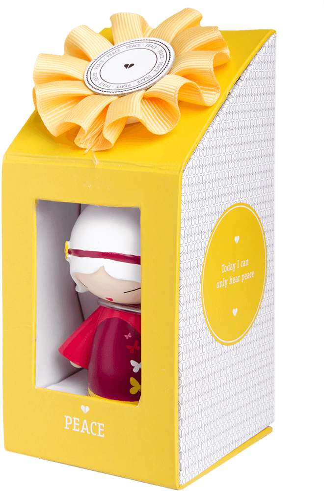 Yellow gift box with bow featuring Peace Momiji doll, a kawaii collectible with secret message: "Today I can only hear peace. — Momiji Doll