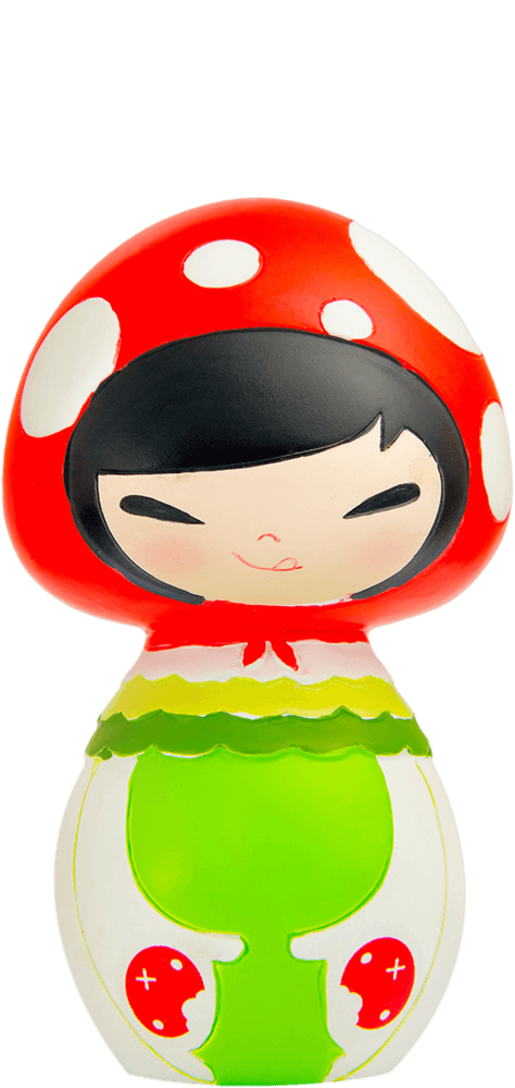Snuggle Momiji doll with red mushroom hat, black hair, green dress, and a big smile against a white background. — Momiji Doll