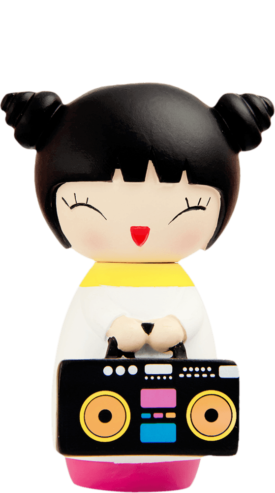 Party Girl Momiji doll with black hair in buns, holding a boombox, in white outfit with yellow and pink accents. — Momiji Doll