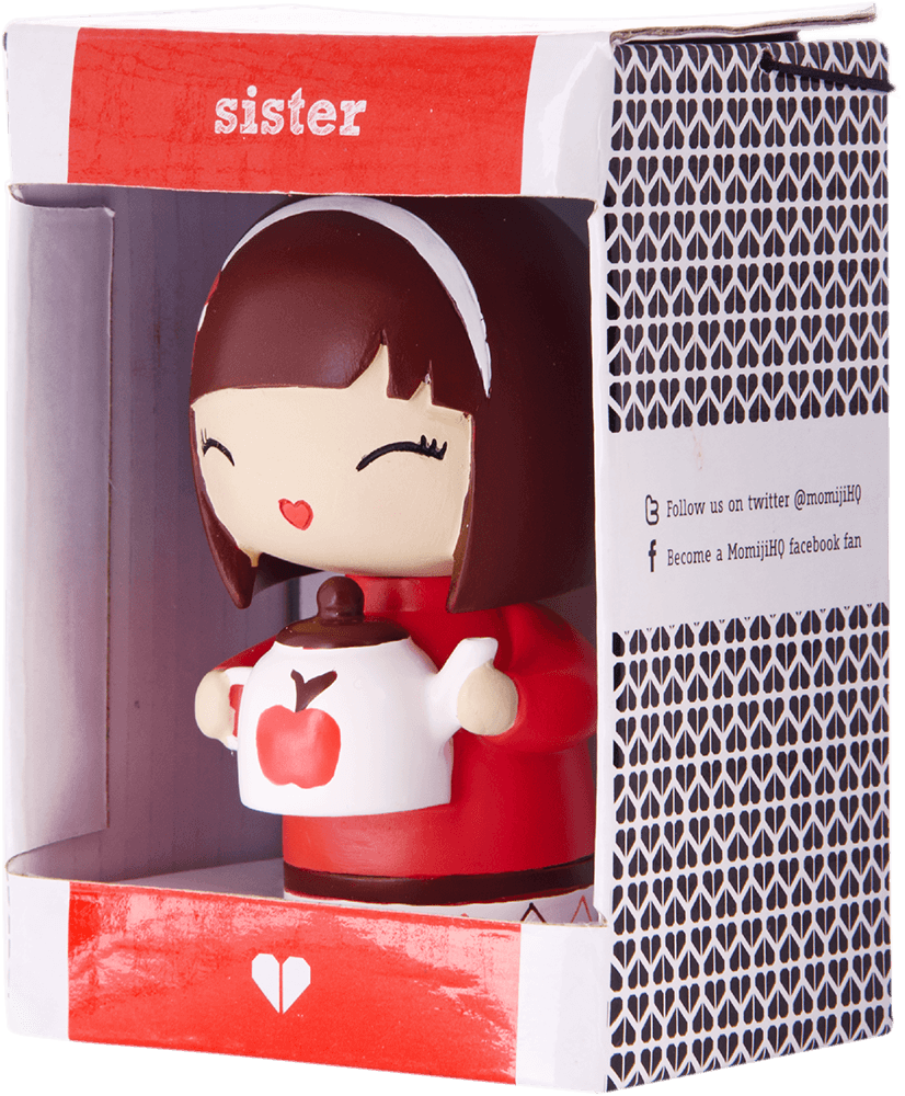 The Sister Momiji doll holds an apple teapot, wearing red details, packaged in a red and white gift box. — Momiji Doll