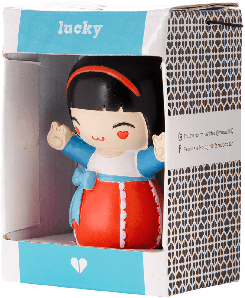 Lucky Momiji doll with black hair, red headband, and red dress shown inside its packaging. — Momiji Doll