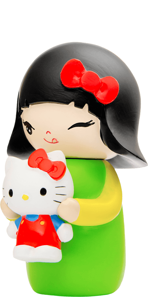 Aya Momiji doll with black hair, red bow, holding a Hello Kitty plush. Kawaii collectible with hidden message inside. — Momiji Doll