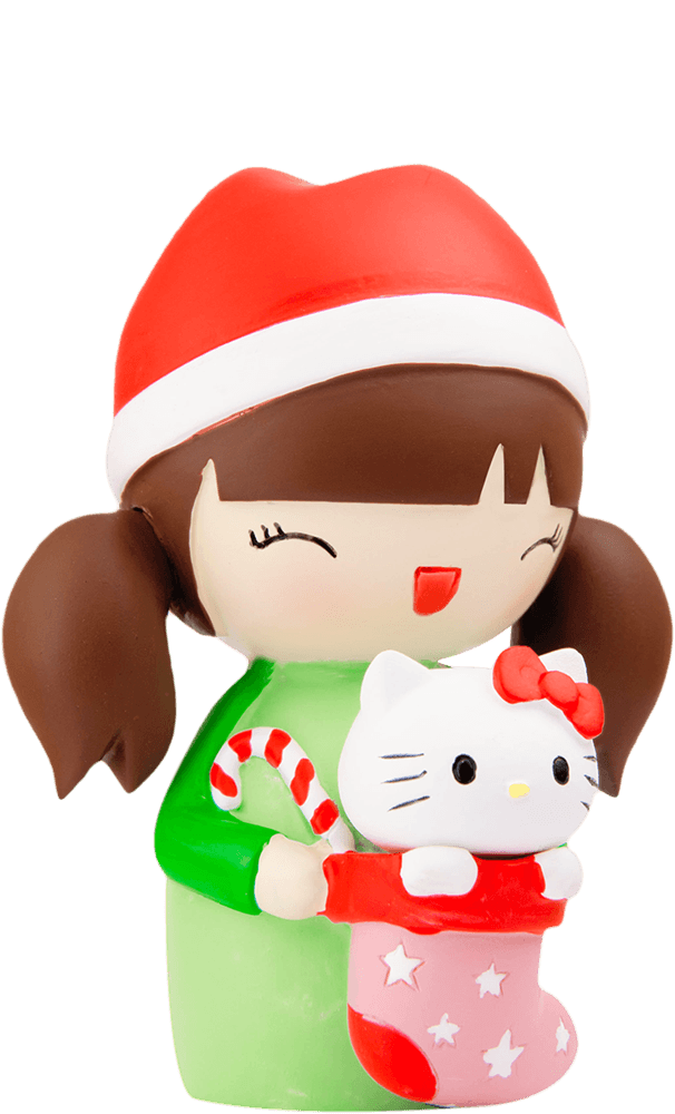 A smiling Momiji doll in a Santa hat holds a kawaii stocking with a candy cane and the collectible Suki cat toy. — Momiji Doll