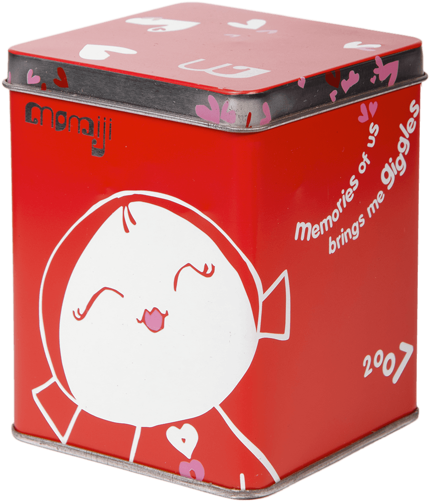 Red tin box named "Valentine" featuring a kawaii Momiji doll, hearts, and text: "memories of us brings me giggles and 2007. — Momiji Doll