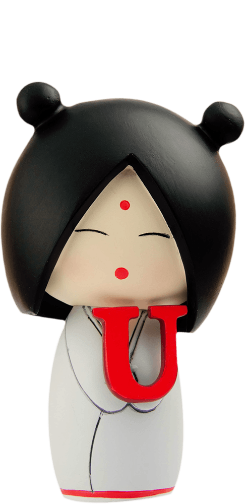 The I heart U Momiji doll has black hair, a white robe with red accents, and holds a red letter U; includes hidden message compartment. — Momiji Doll