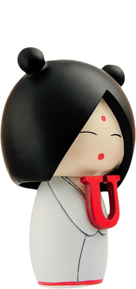 I heart U Momiji doll with black hair, closed eyes, red lips, a white outfit, and holding a bright red U shape. — Momiji Doll