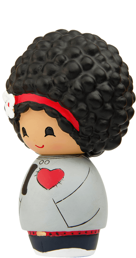 Momiji doll "Mika" with large curly black hair, red headband, gray jacket with red heart detail, and blue pants. — Momiji Doll
