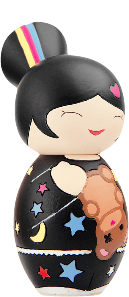 Nani Momiji doll with black hair, colorful striped outfit, star and moon motifs, smiling face, and holding a teddy bear. — Momiji Doll