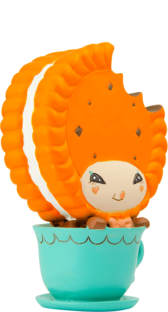 Dippy-D Momiji doll: Smiling girl as an orange cookie sandwich, seated in a turquoise teacup collectible. — Momiji Doll