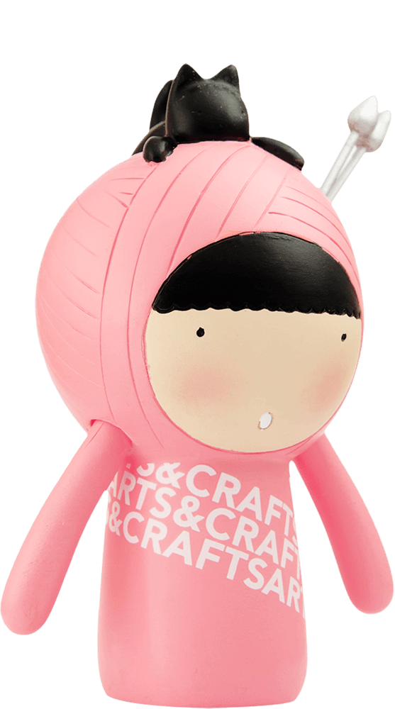Purrl Momiji doll in pink, black cat on head, black hair, "CRAFTS & ARTS" text on body. Kawaii collectible vinyl character. — Momiji Doll