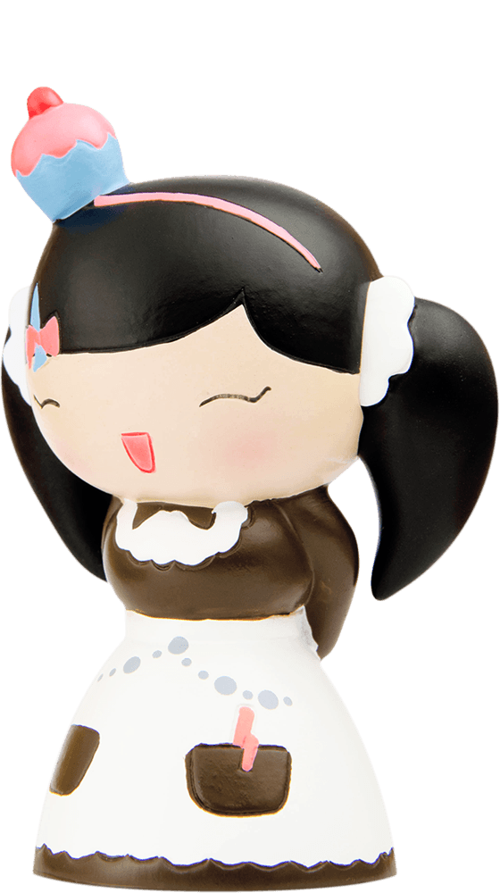 Chiyo Momiji doll with black pigtails, a white apron, and a blue cupcake on her head. Kawaii collectible character. — Momiji Doll