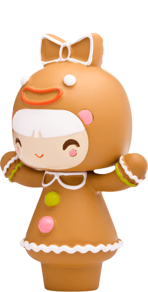 Treacle Momiji doll dressed in a gingerbread cookie costume with colorful buttons and a big bow, kawaii collectible charm. — Momiji Doll