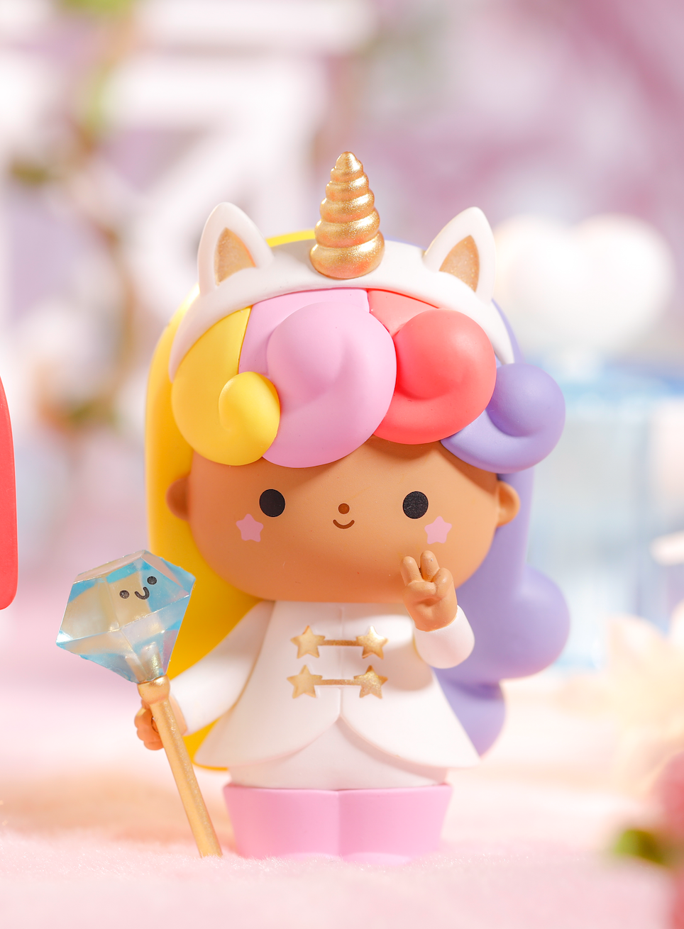 Uniqueenie Momiji doll with colorful hair, unicorn horn, and a crystal staff shaped like a smiling face. Collectible kawaii charm!. — Momiji Doll