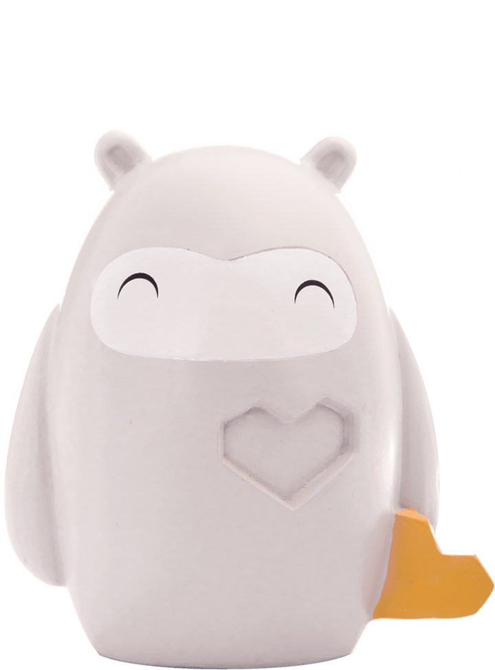 Kindness Momiji doll is round, white, with small ears, a yellow wing, and a chest heart. Kawaii collectible by indie artists. — Momiji Doll