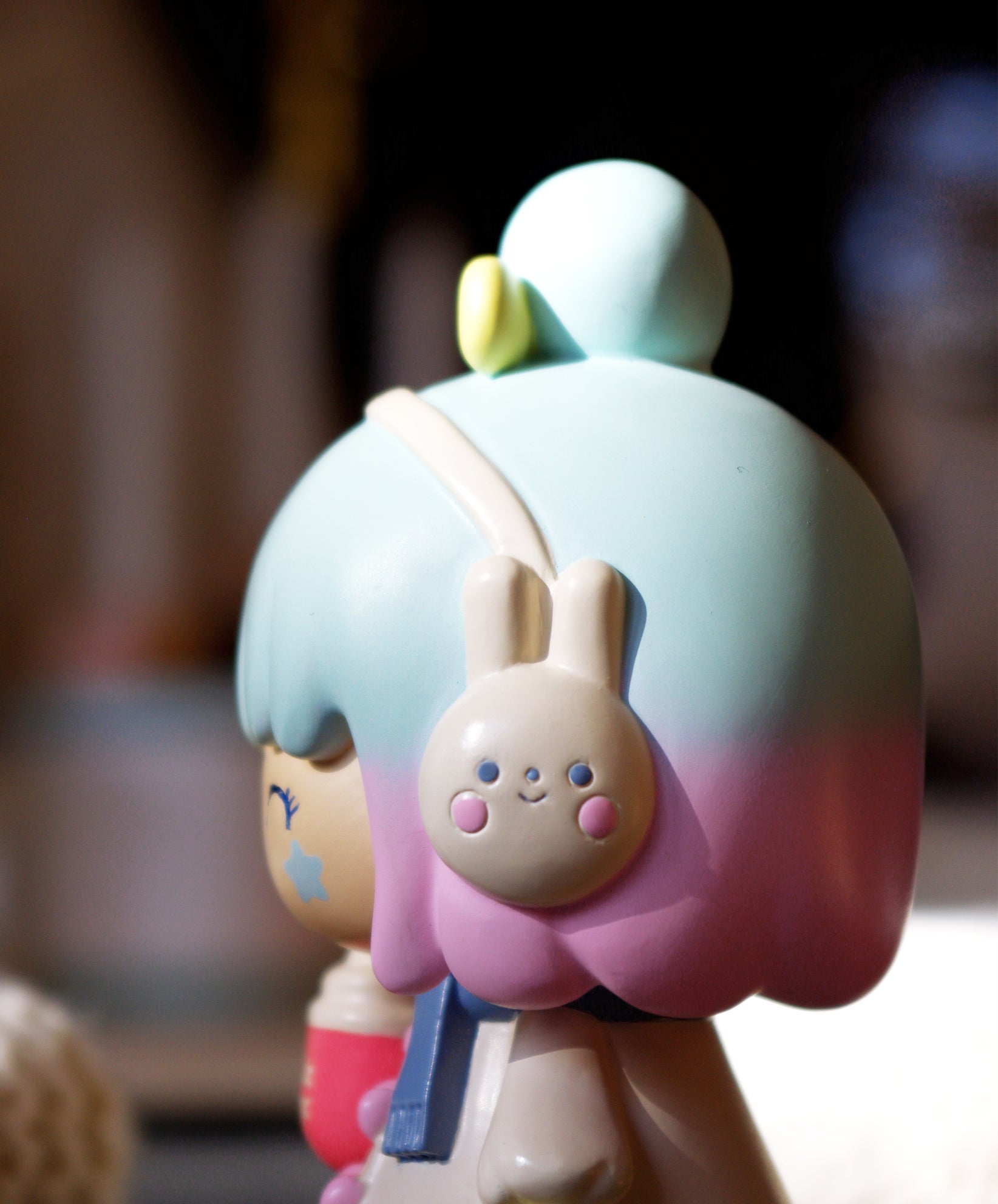 Winter Wonderland 2020 Momiji doll with pastel blue-pink hair, bunny earmuffs, and cozy winter outfit; secret message hidden inside. — Momiji Doll