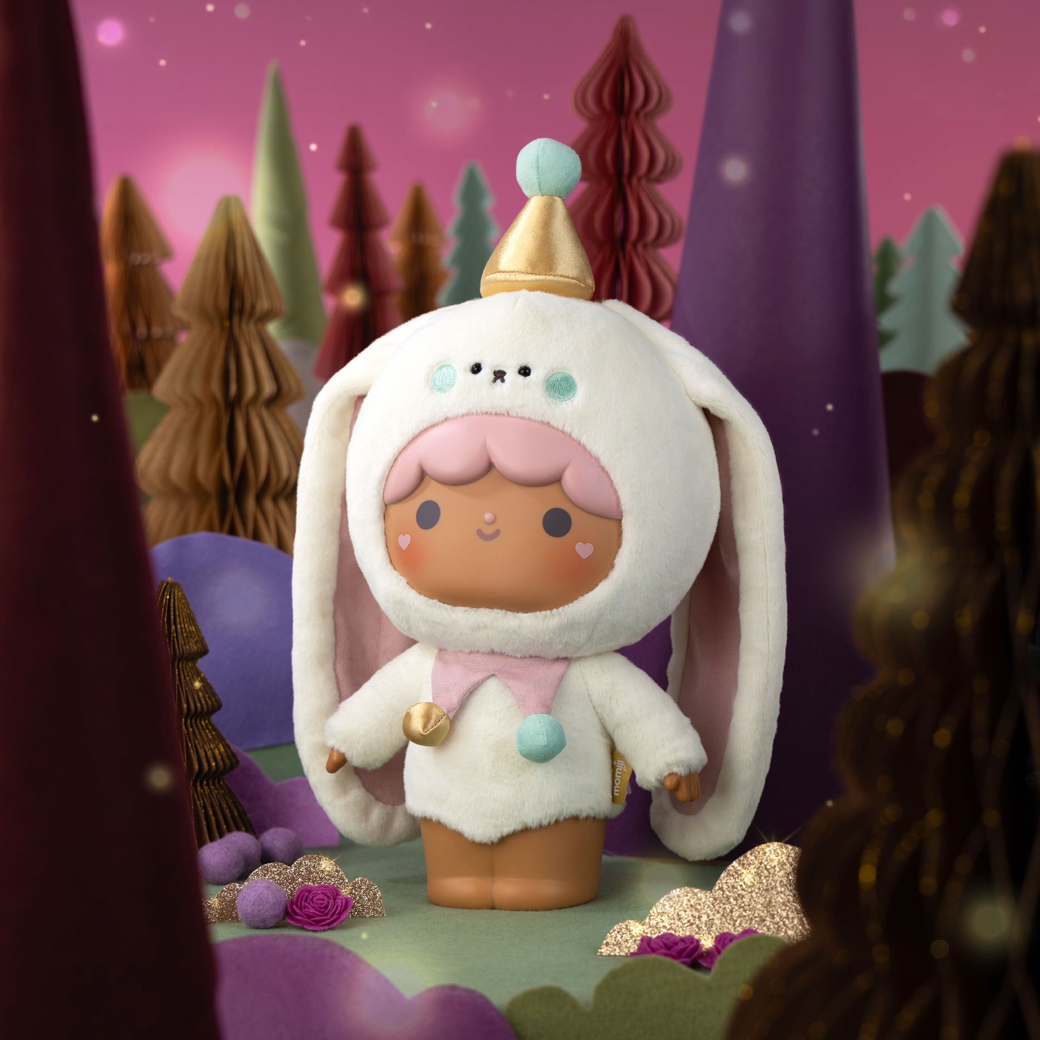 Bonbon Butterkins Momiji doll in a bunny suit poses in a pastel, whimsical forest amid gentle trees and soft colors. — Momiji Doll