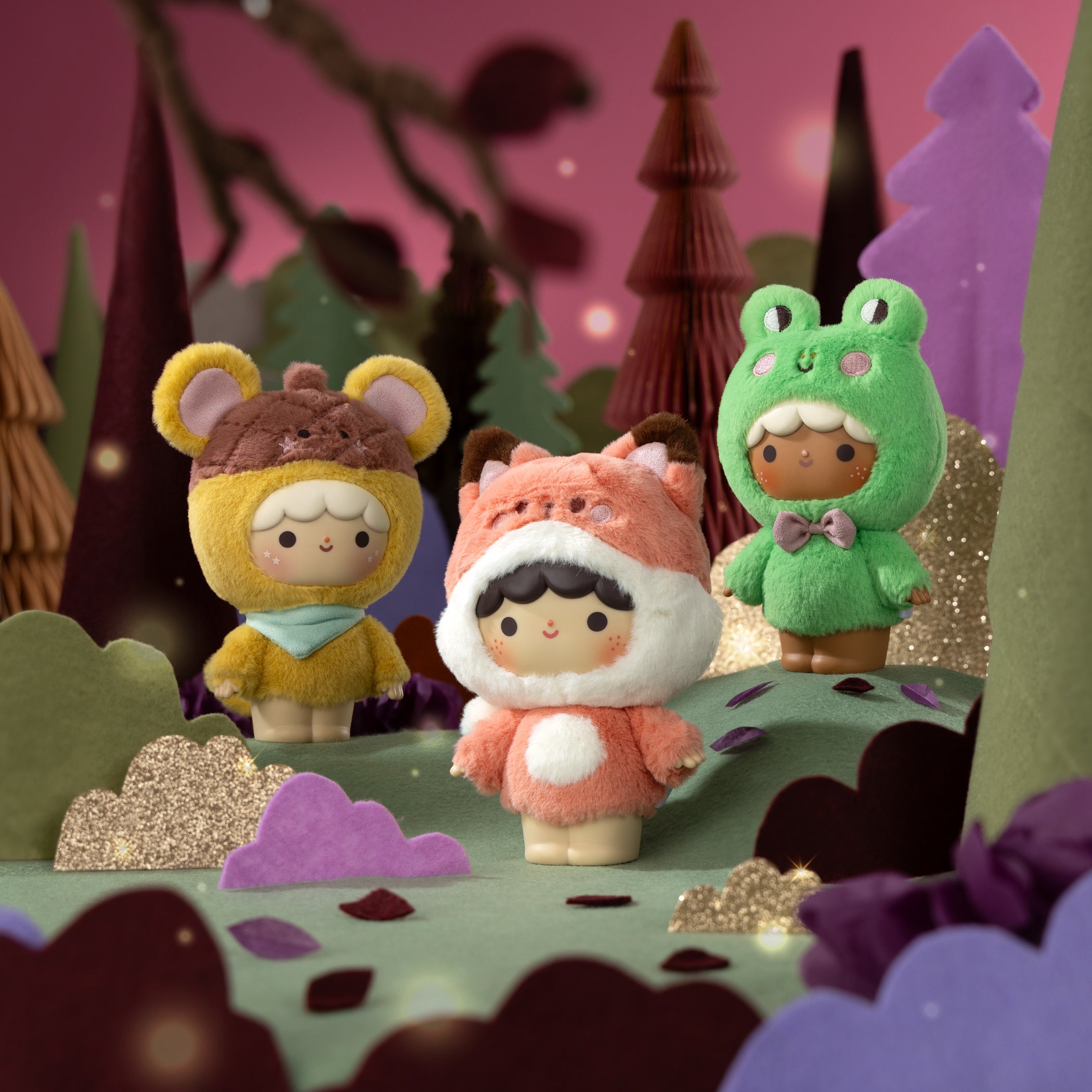 Sugar Plum Momiji doll trio dressed as animals, in a twinkling pastel forest. Each cute collectible hides a message. — Momiji Doll