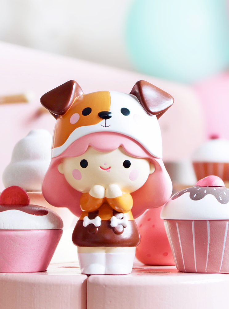 BFF Momiji doll wears a cute dog hoodie, surrounded by toy cupcakes and pastel decorations. Hidden message inside the Momiji doll. — Momiji Doll