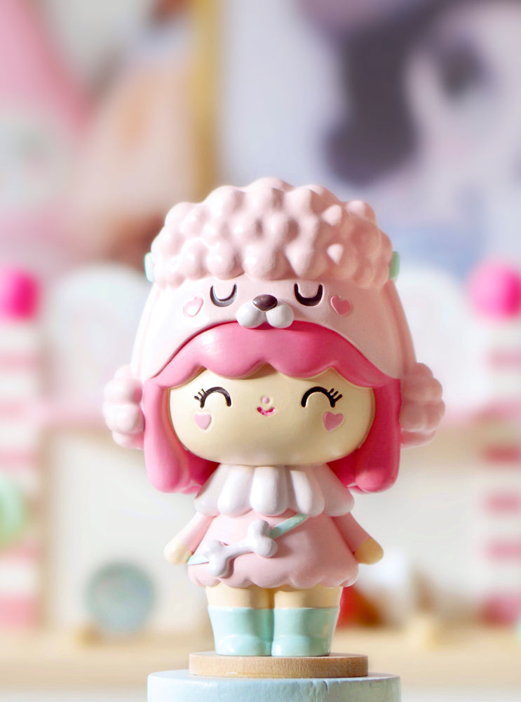 Best Friends Momiji doll with pink hair, poodle hat, and heart cheeks smiles against a soft pastel background. — Momiji Doll