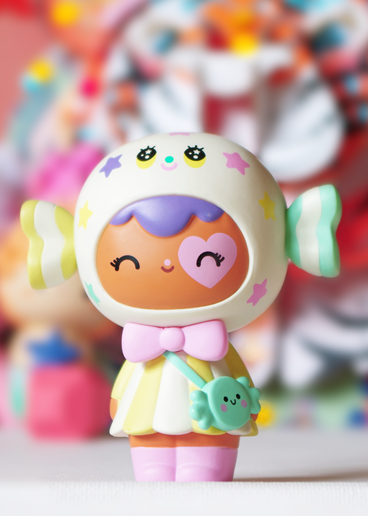 Candy Button 3 Momiji doll: pastel vinyl, candy hat, winking face, heart on cheek, purse in hand, standing upright. — Momiji Doll