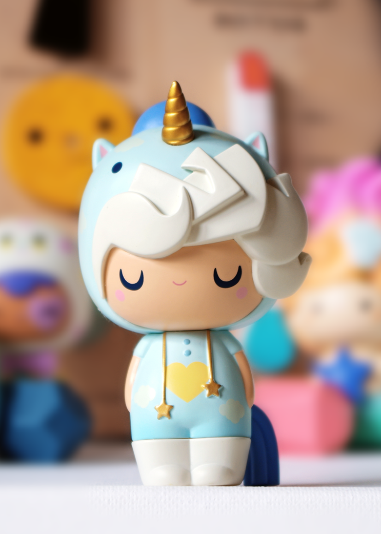 Momiji doll Little Starlight Girl (Head in the Clouds Edition) wears a blue unicorn suit, gold horn, and has white hair. — Momiji Doll