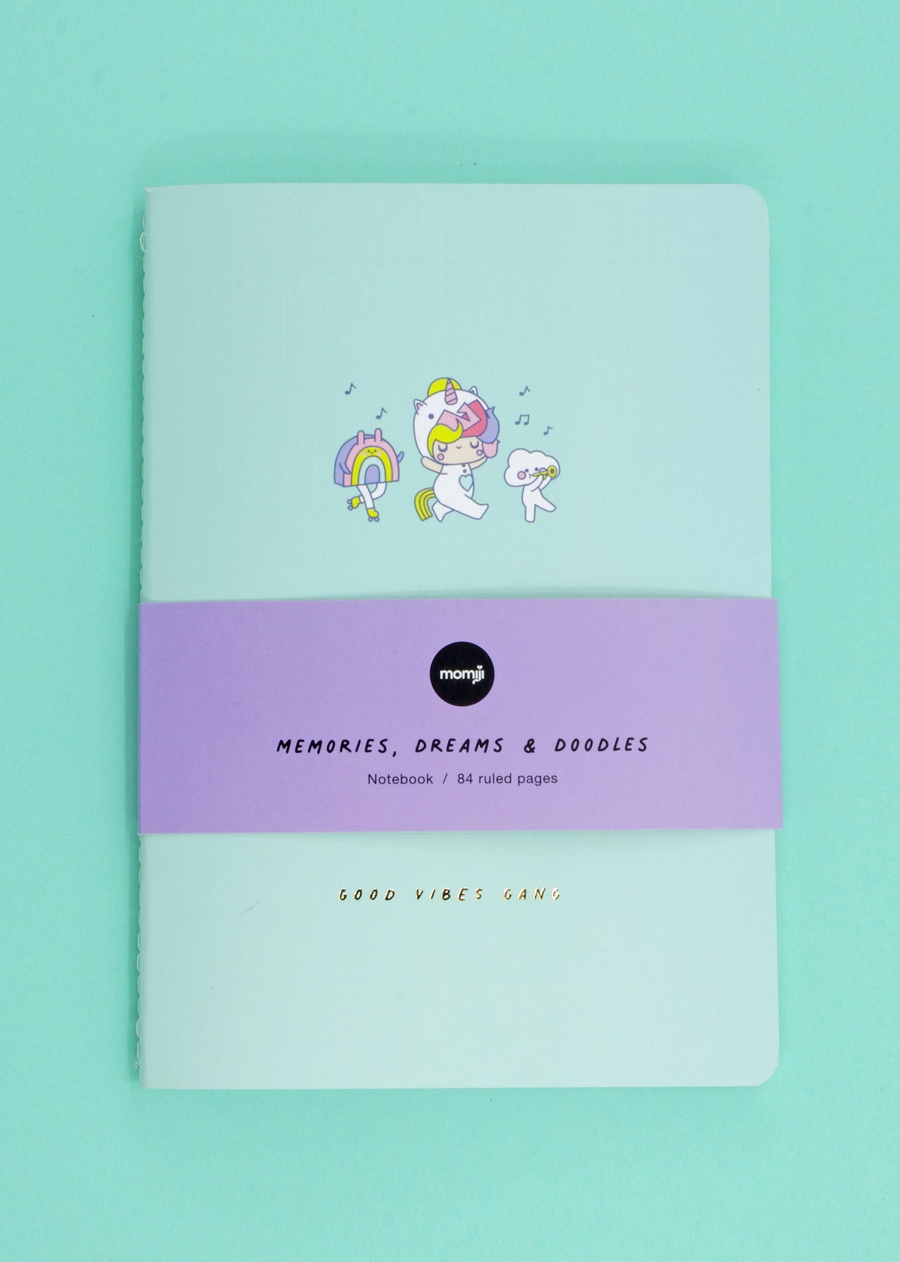 Momiji doll-themed A5 notebook, light blue linen cover, unicorn & rainbow art, wrapped in a purple "MEMORIES" band. — Momiji Doll