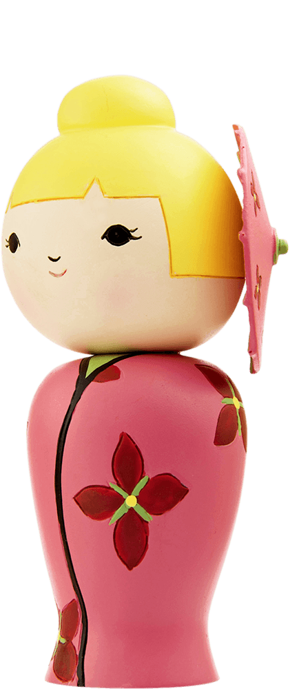 Sunnyshine Momiji doll with yellow hair in a bun, pink floral outfit, and includes a collectible charm. — Momiji Doll