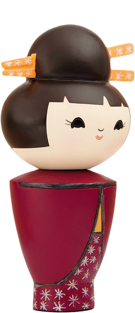 Dizzy Momiji doll with a round head, black hair in a bun with chopsticks, and a vibrant red patterned outfit. — Momiji Doll