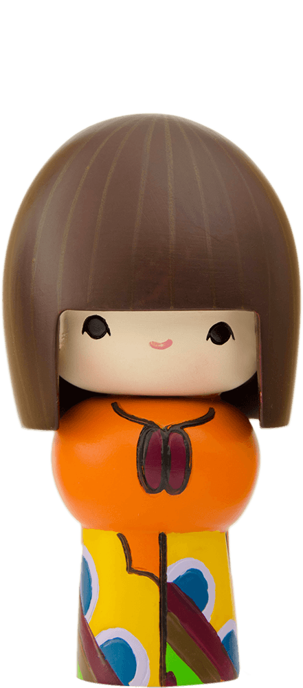 Rainbows Momiji doll with brown hair, orange top, and vibrant colorful patterns. Secret message slot at base. — Momiji Doll