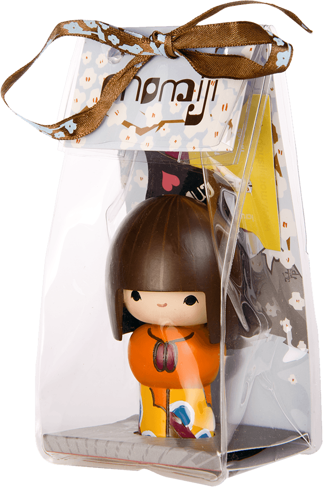 Rainbows Momiji doll with brown hair, orange outfit, clear gift bag tied with brown ribbon and finished with a tag. — Momiji Doll