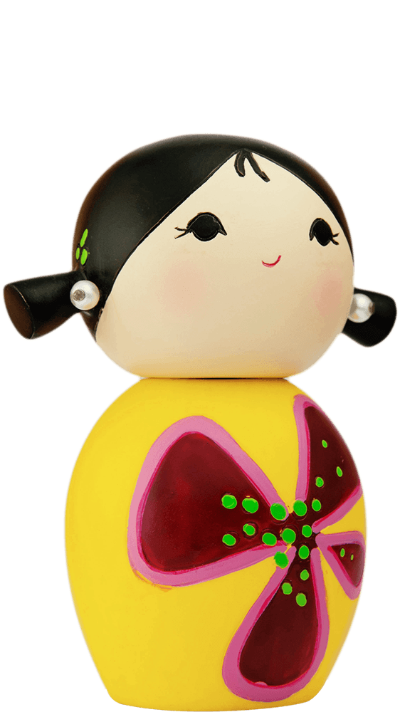 Dreaming Momiji doll featuring black hair, a yellow dress, red flower accents, and a bright smiling face. — Momiji Doll