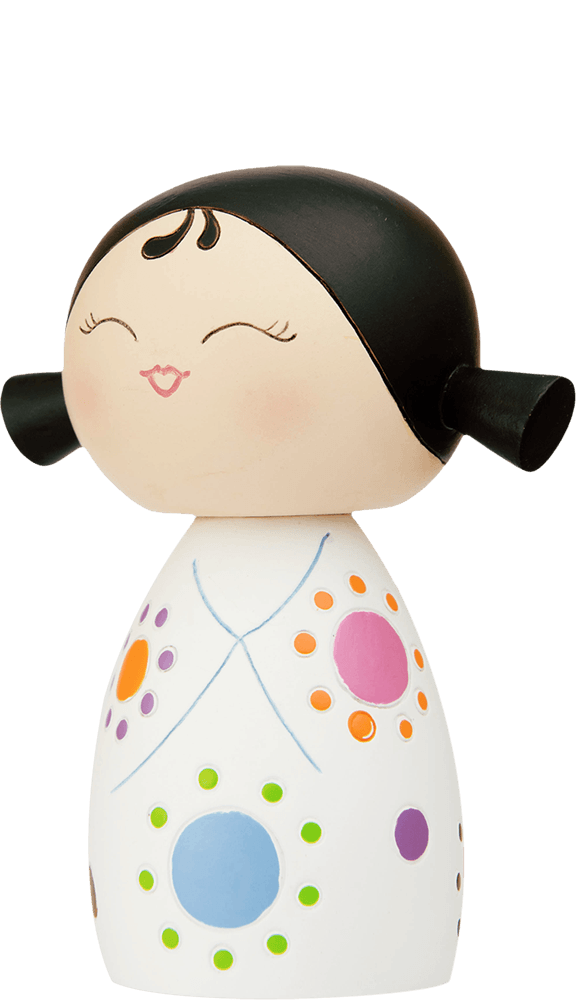 Giggles 2 Momiji doll with black hair, a white dress, and colorful dots. Each Momiji doll hides a secret message inside. — Momiji Doll