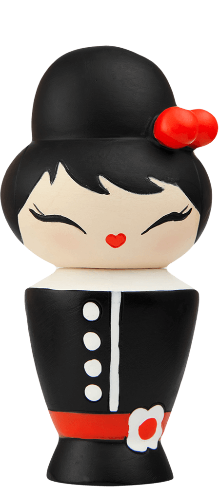 Coco Momiji doll has black and white coloring, a red bow and belt, flower detail, and a smiling face with closed eyes. — Momiji Doll