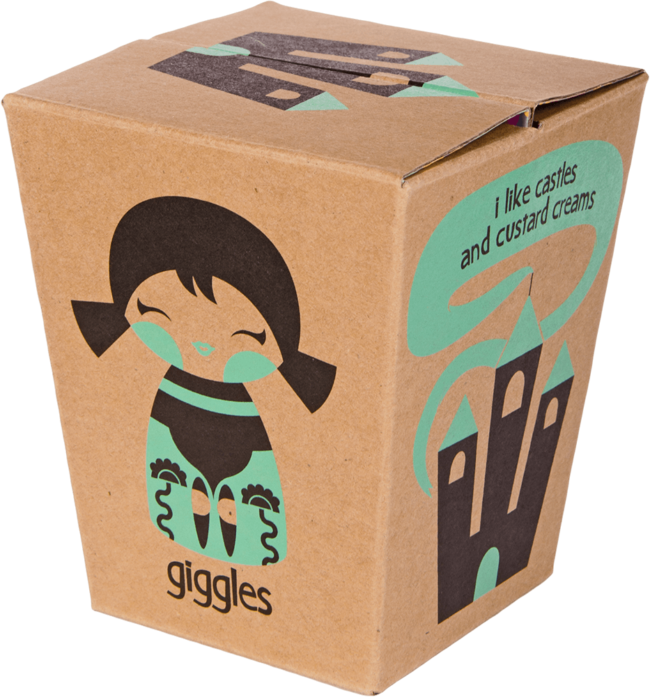 Brown box featuring Giggles Momiji doll, cute cartoon girl, a castle illustration, and "Giggles" text on the front. — Momiji Doll