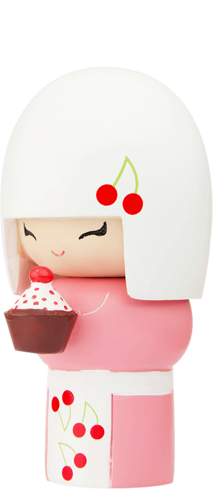 Pixie Momiji doll with cherry patterns, holding a cupcake and smiling; kawaii collectible hiding a secret message inside. — Momiji Doll