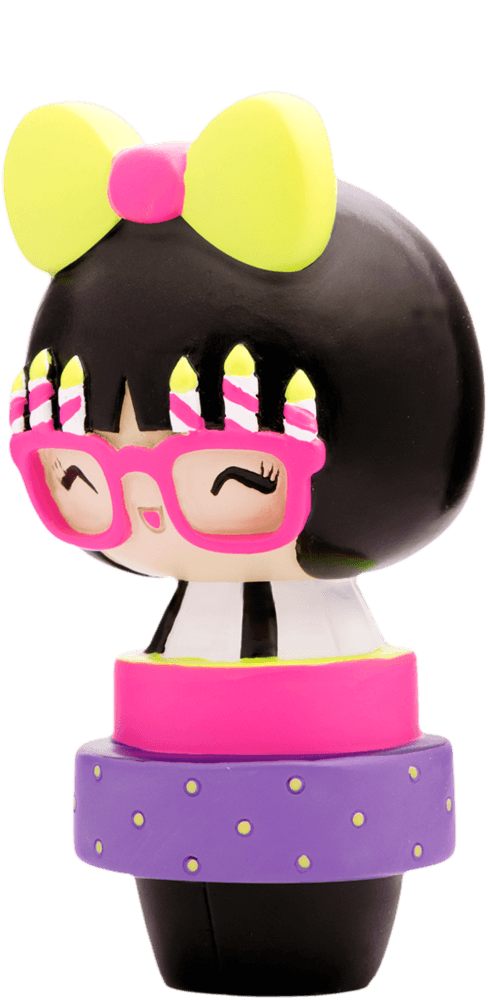 Birthday Girl Momiji doll with pink glasses, a yellow bow, birthday candles, and a purple polka-dot outfit. — Momiji Doll