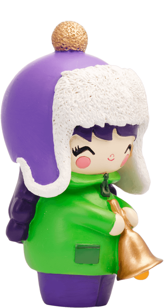 Winter Wonderland Momiji doll in a green coat, purple hat, white ear flaps and gold bell, smiling with a hidden message inside. — Momiji Doll