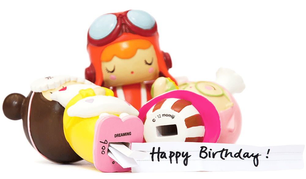 Three BFF Dina Momiji dolls with closed eyes, pastel outfits, and a "Happy Birthday!" note in front of them. — Momiji Doll