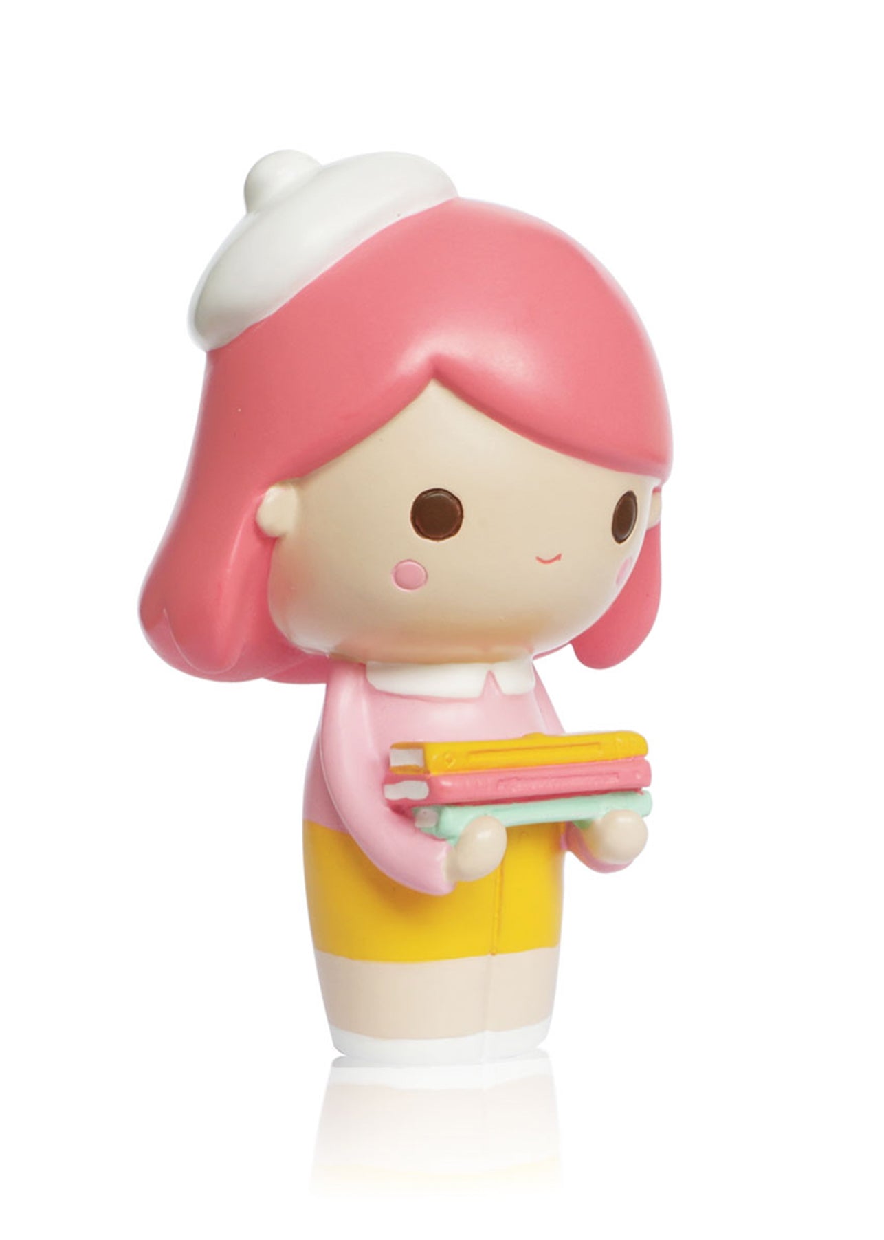 Curiosity Momiji doll with pink hair, white hat, yellow skirt, pink top, holding books. Designed by independent artists. — Momiji Doll
