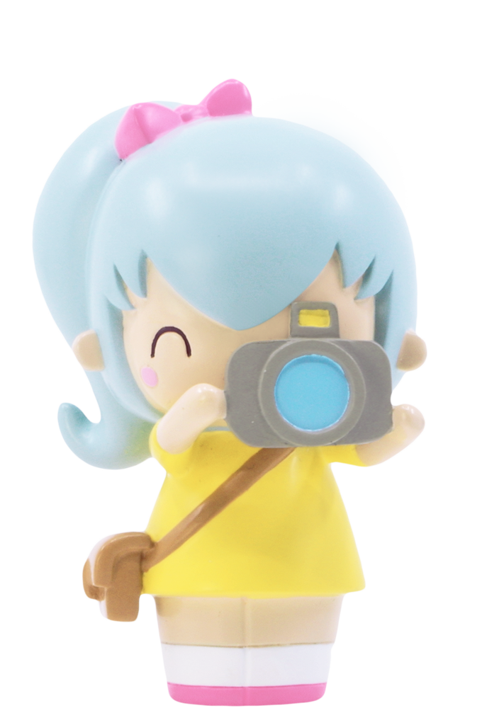 Pixie Pixel Momiji doll with blue hair, pink bow, yellow outfit, smile, and camera—kawaii collectible with secret message inside. — Momiji Doll
