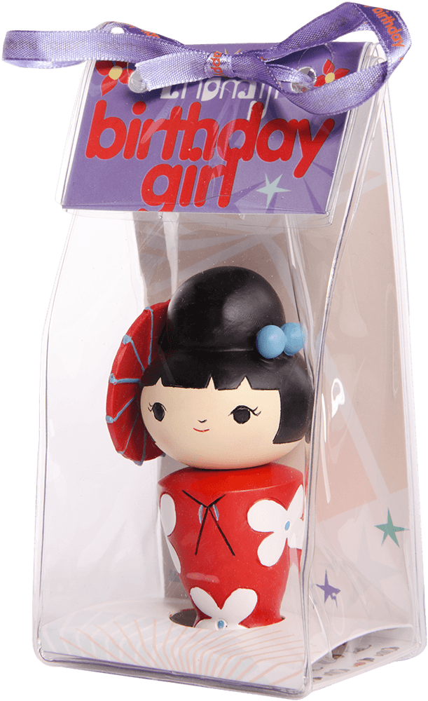 Birthday Girl Momiji doll in a red floral dress, displayed in a clear gift box finished with a purple ribbon. — Momiji Doll