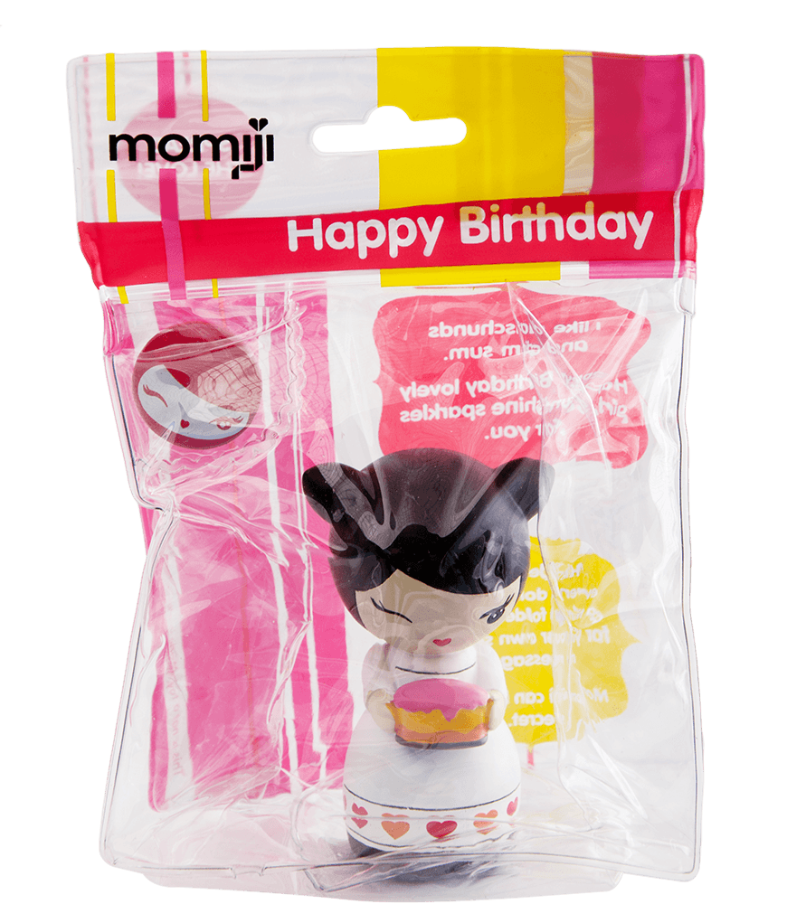 A Momiji Happy Birthday doll in clear packaging, holding a pink birthday cake with white frosting and a candle. — Momiji Doll